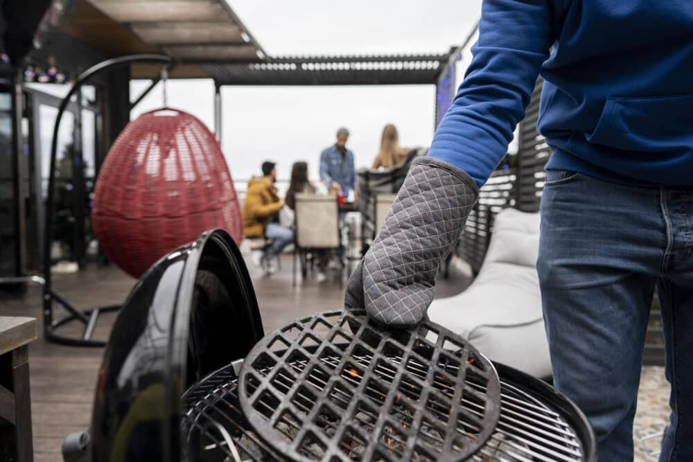 man preparing barbecue cooking
